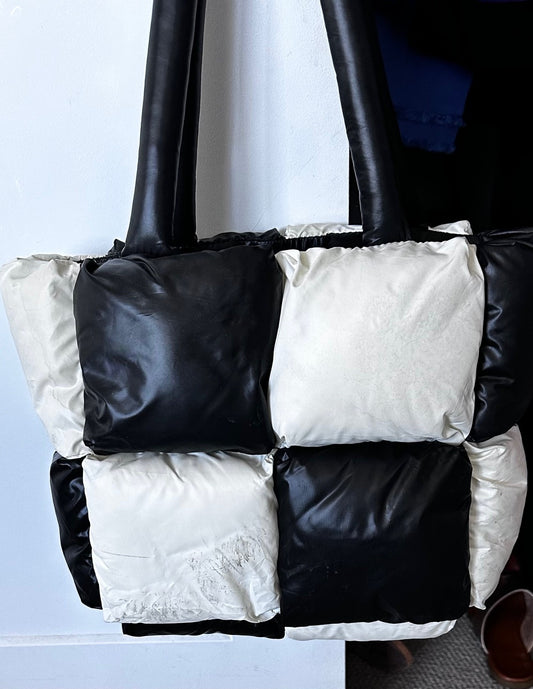 Puffy Black and Cream Colored Bag